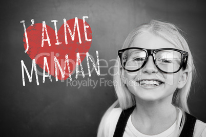 Composite image of schoolchild with blackboard