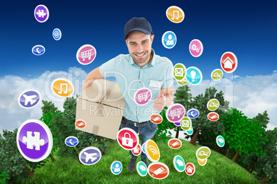 Composite image of delivery man with cardboard box gesturing thu