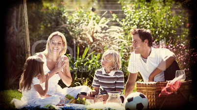 Happy family having a picnic