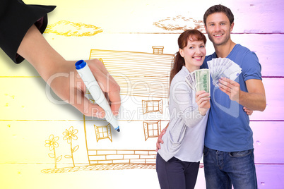 Composite image of couple holding fans of cash