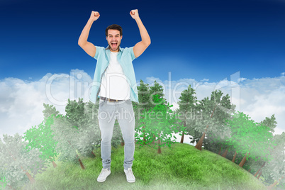 Composite image of happy casual man cheering at camera