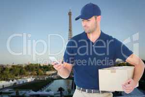 Composite image of delivery man using mobile phone while holding