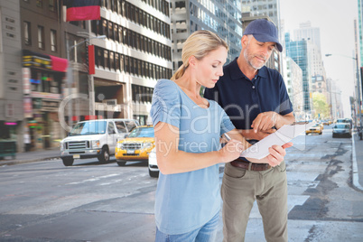 Composite image of happy blonde signing for a delivery Composite image of happy blonde signing for a delivery