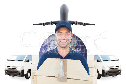 Composite image of happy delivery man holding cardboard box