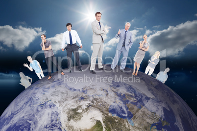 Composite image of people standing on earth