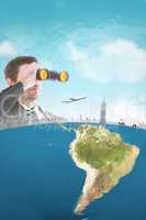 Composite image of young businessman looking through binoculars