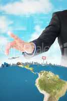 Composite image of businessman hand pointing something