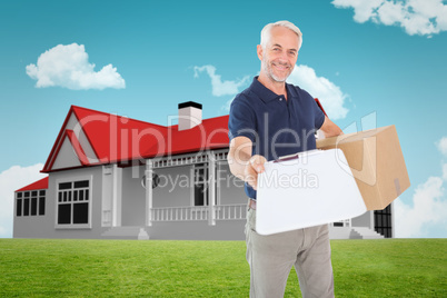 Composite image of happy delivery man holding cardboard box and