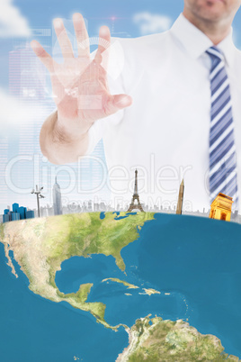 Composite image of handsome businessman gesturing with hand