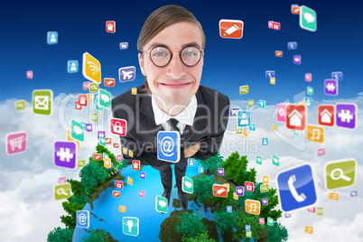 Composite image of geeky businessman smiling at camera