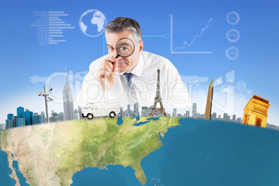 Composite image of focused businessman with magnifying glasses