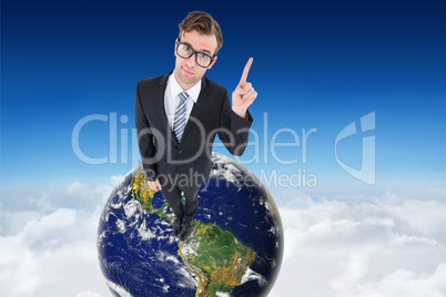 Composite image of geeky hipster businessman with finger up