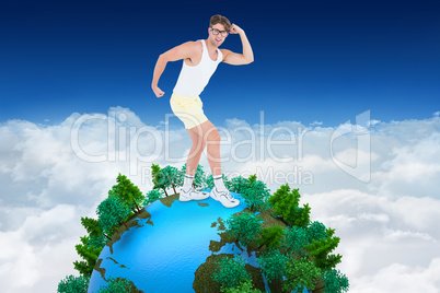 Composite image of geeky hipster posing in sportswear