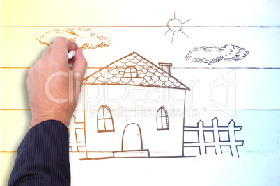 Composite image of hand of a businessman writing with a chalk