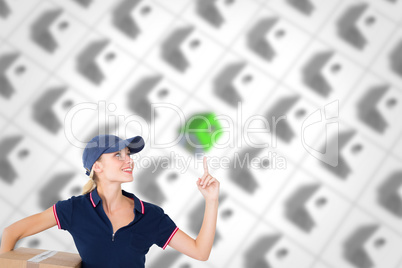 Composite image of happy delivery woman holding cardboard box an