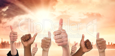 Composite image of hands showing thumbs up