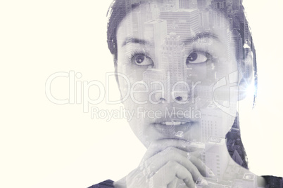 Composite image of thoughtful asian businesswoman