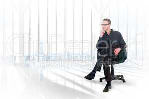 Composite image of thoughtful businessman sitting on a swivel ch