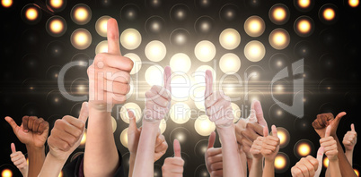 Composite image of hands showing thumbs up