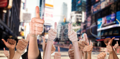 Composite image of hands showing thumbs up