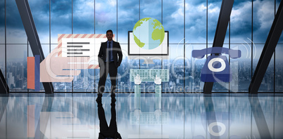 Composite image of businessman standing