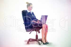 Composite image of businesswoman sitting on swivel chair with la