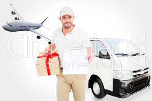 Composite image of delivery man giving clipboard for signature