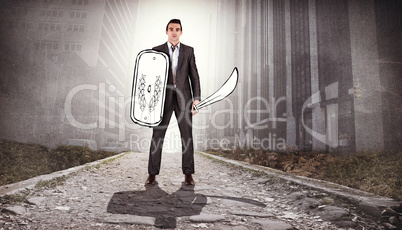 Composite image of corporate warrior