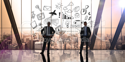 Composite image of businessman standing with hands on hips