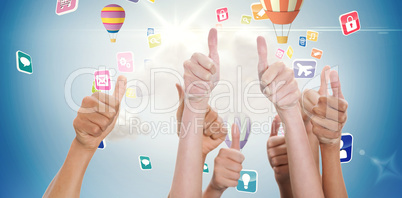 Composite image of hands up and thumbs raised