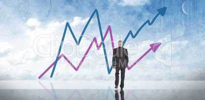 Composite image of businessman walking