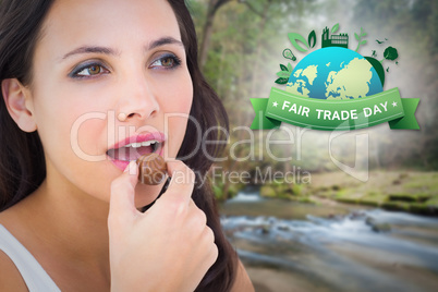 Composite image of pretty brunette eating chocolate candy