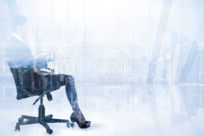 Composite image of businesswoman sitting on swivel chair with ta