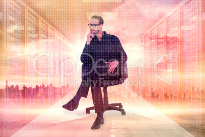 Composite image of thoughtful businessman sitting on a swivel ch