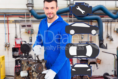 Composite image of smiling male mechanic repairing car engine
