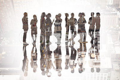 Composite image of many business people standing in a line