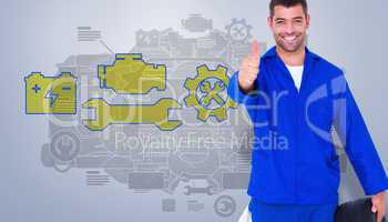 Composite image of mechanic with tire gesturing thumbs up