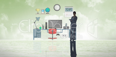 Composite image of businesswoman holding tablet