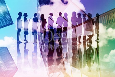 Composite image of many business people standing in a line