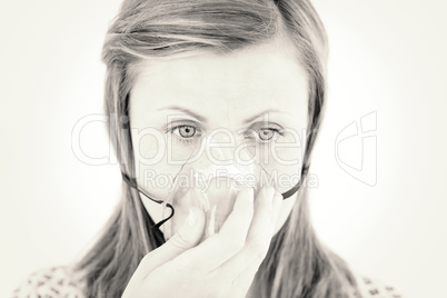 Diseased young woman wearing a mask