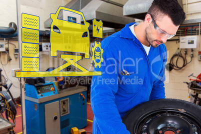Composite image of mechanic working on tire