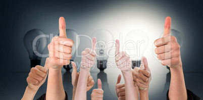 Composite image of hands showing thumbs up