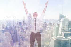 Composite image of smiling businessman cheering with his hands u