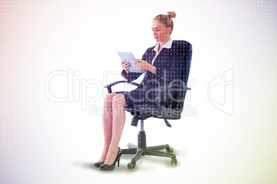 Composite image of businesswoman sitting on swivel chair with ta