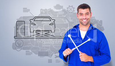 Composite image of smiling male mechanic holding lug wrench