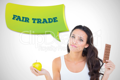 Composite image of pretty brunette deciding between apple and ch