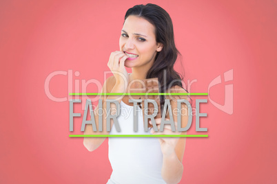 Composite image of pretty brunette fearfully looking at chocolat