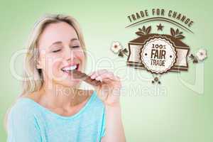 Composite image of pretty blonde enjoying and eating bar of choc