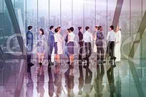 Composite image of many business people standing in a line