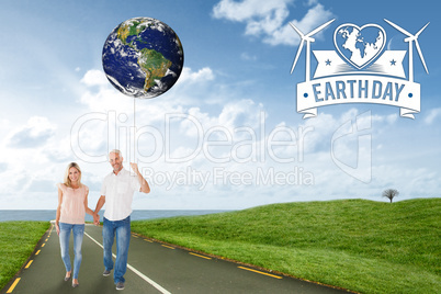 Composite image of happy couple walking holding hands